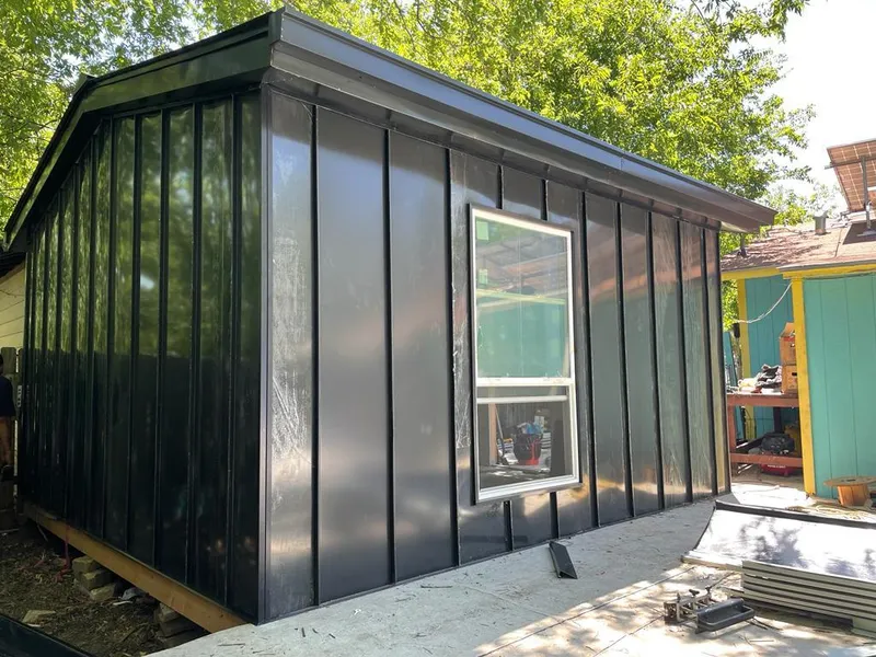 Black standing seam metal wall panels for Roof Inspection in Lake Arbor