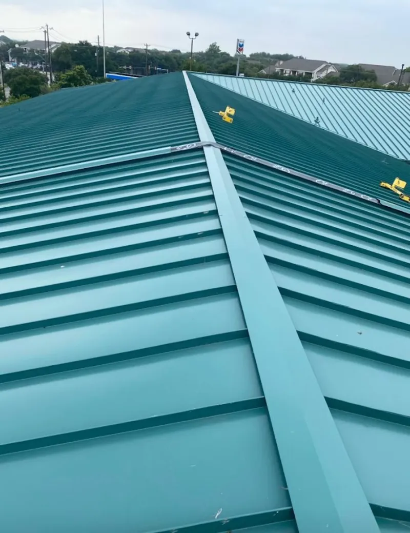 Green commercial metal roof ridge and valley for Metal Roof Repair in Lake Arbor